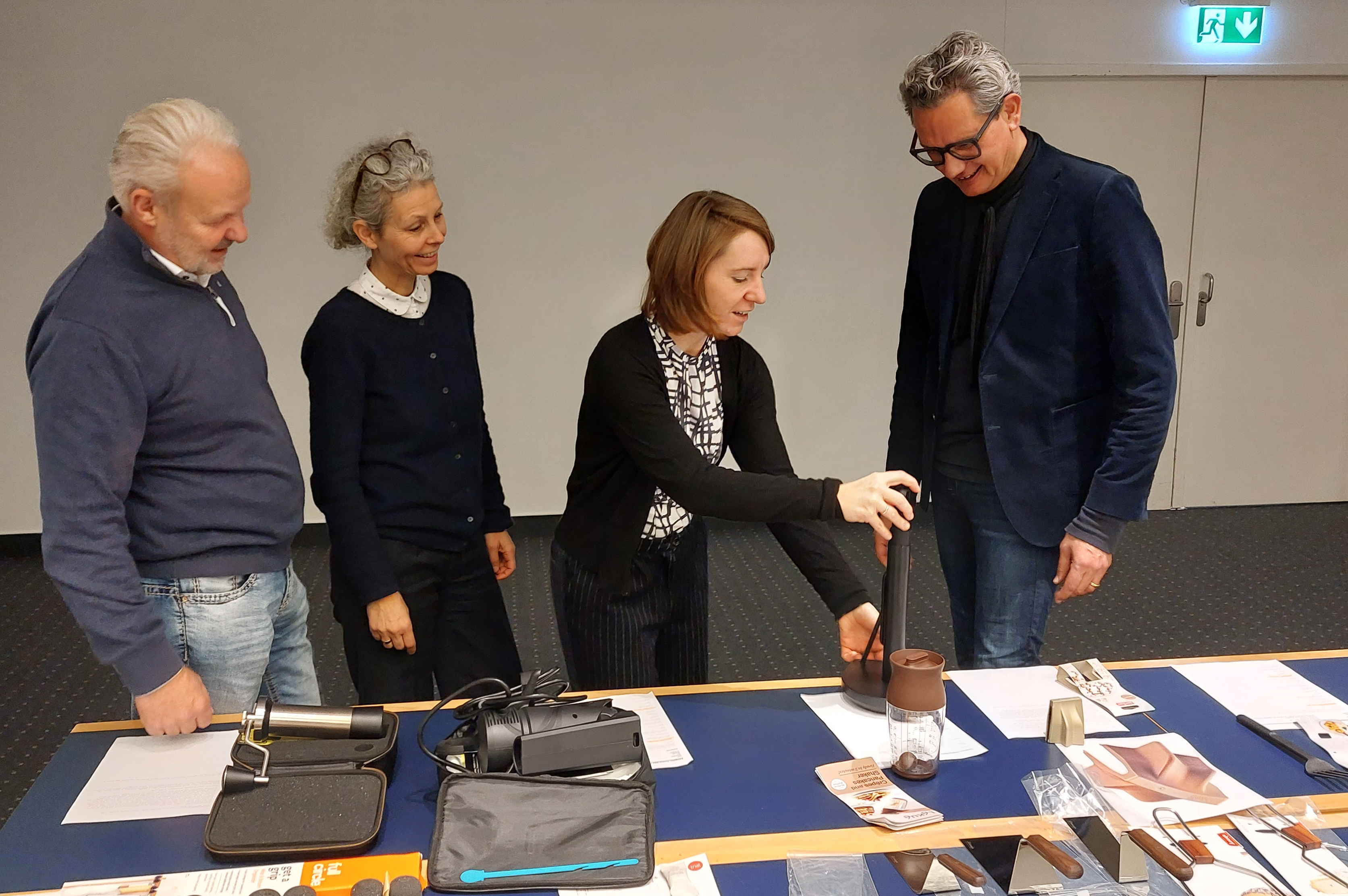 Testing the products for the special presentation Solutions at Ambiente 2024: Thomas Kastl, Director Ambiente Dining, Dorothe Klein, Director Content, Julia Uherek, Vice President Consumer Goods Fairs, and industrial designer Sebastian Bergne (f.l.). Photos: Messe Frankfurt.
